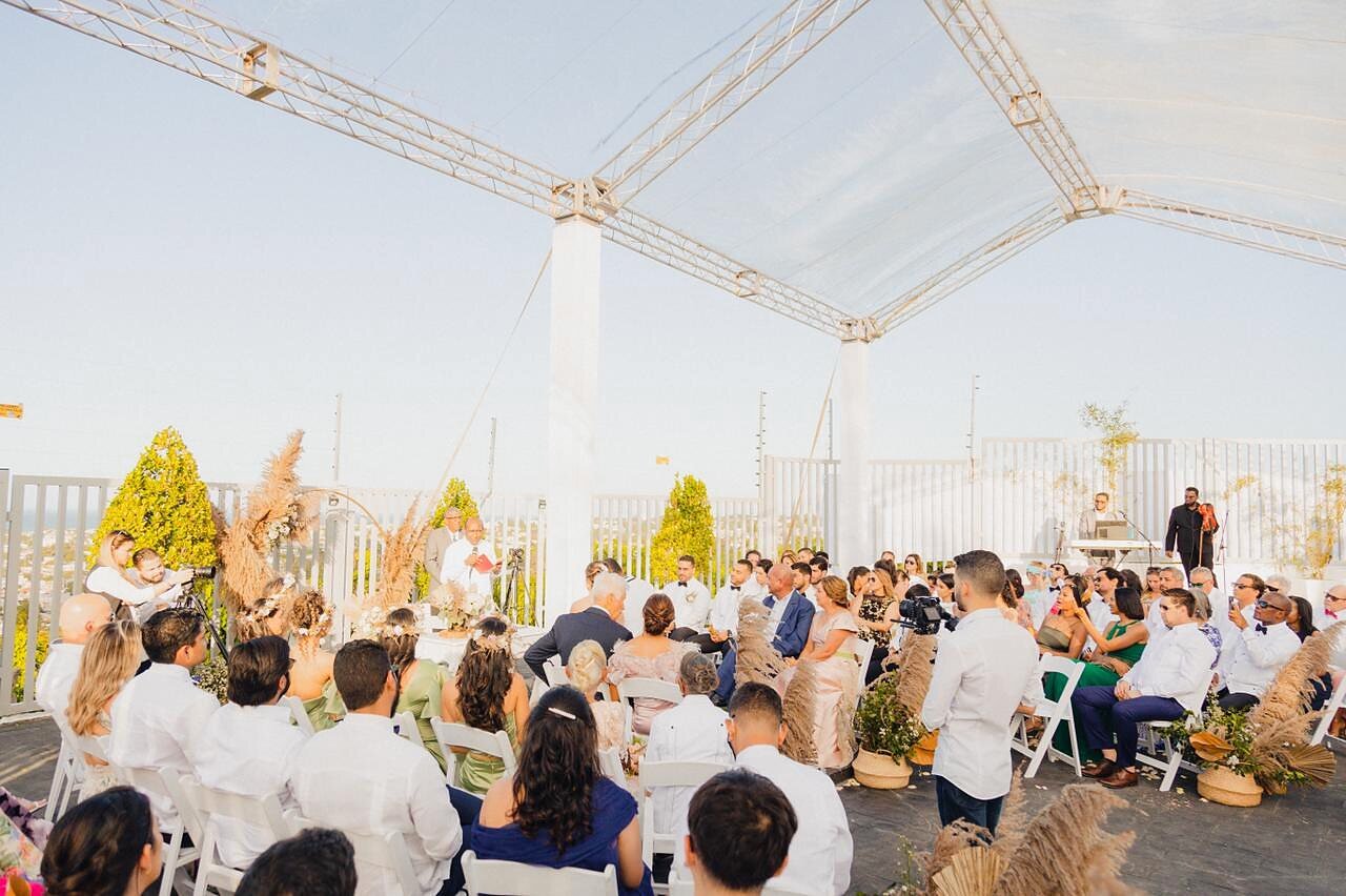 Wedding ceremony seating with guests, overlooking Puerto Plata